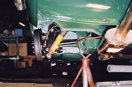 Underside of Triumph GT6 showing Schultz rubberised layer and stainless steel exhaust